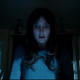 Malignant star Annabelle Wallis looks at some concept art for the film.